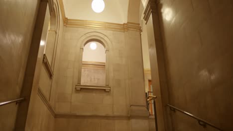 Interior-view-of-staircase-of-illuminated-Wolfson-Reading-Room-of-Manchester-Central-Library-in-Manchester,-England