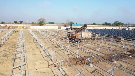 Aerial-drone-view-towards-the-loan-side-where-many-solar-panels-are-visible