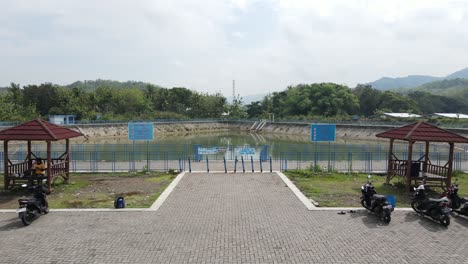 aerial-view,-Imogiri-Embung-or-Imogiri-reservoir-in-Imogiri-Bantul-which-is-a-place-to-accommodate-the-flow-of-rainwater-which-has-a-shape-like-a-puppet-mountain