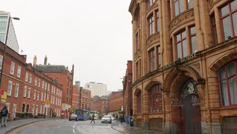 Closeup-shot-of-vehicles-passing-by-the-Canada-House-on-a-cold-cloudy-day-in-England