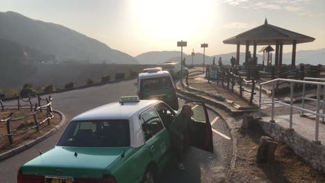 Taxi-drivers-wait-for-customers-at-the-East-Dam-in-San-Kung-East-Country-Park,-Hong-Kong