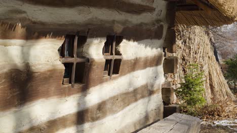 Small-House-Windows-With-Thatched-Roof