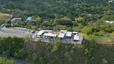 Aerial-Restaurants-at-Hill-Close-To-Christ-the-King,-Cali,-Colombia