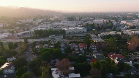 Drone-Flying-Over-Soundstages-at-CBS-Radford-Studios-in-Los-Angeles,-California-on-Sunny-Day