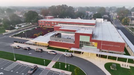 Outside-entrance-of-new-public-school-building-in-USA,-education-in-America,-back-to-school-theme