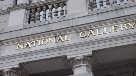 Close-up-entrance-sign-National-Gallery-of-Ireland,-handheld-pan-right