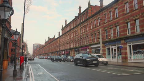 Daytime-Traffic-On-Deansgate-Street-In-Manchester,-UK