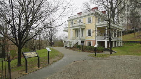 Grounds-of-Alexander-Hamilton-House-with-Signs-In-New-York-City-in-Winter