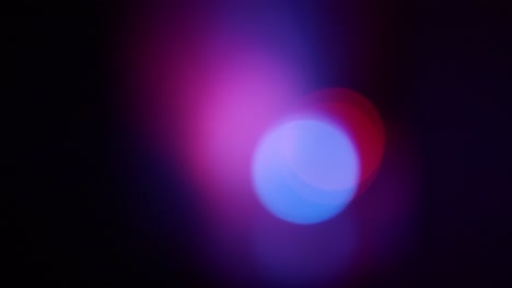 Defocused-Police-Red-Blue-Emergency-Lights-Flashing-In-The-Dark