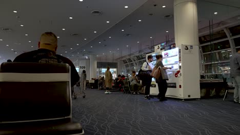 Travellers-use-vending-machines-in-Changi-airport-terminal-departure-lounge