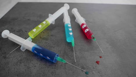 several-syringes-filled-with-colorful-liquid-symbolizing-social-media-addiction