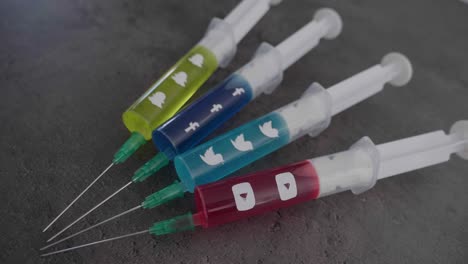 several-syringes-filled-with-colorful-liquid-symbolizing-social-media-addiction