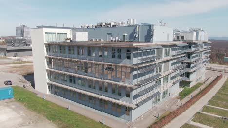 Aerial-Drone-shot-of-CureVac-AG-Company-Headquarter-in-Tuebingen-on-a-sunny-day