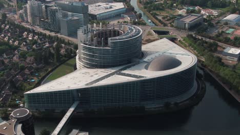 Aerial-Shot-of-the-European-Parliament-in-Strasbourg,-France-on-an-overcast-day