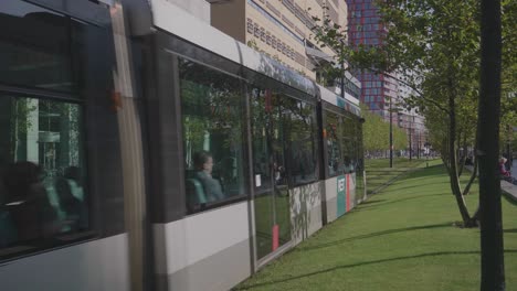 Public-Transport-Metro-Train-in-Rotterdam,-Netherlands-on-a-sunny-afternoon