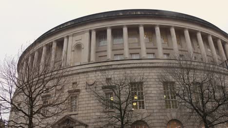 Low-angle-shot-of-vintage-external-architecture-of-Manchester-Central-Library-during-the-month-of-January-in-Manchester,-England