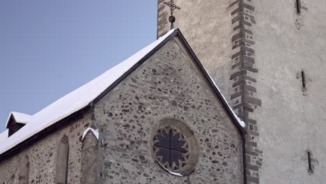 Collegiate-Church-in-the-town-center-of-Innichen---San-Candido,-South-Tyrol,-Italy,-a-roman-style-building