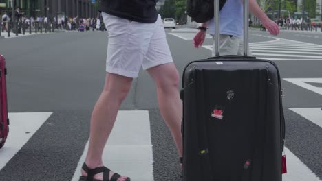 Traveller-Walking-over-a-street-in-Tokyo,-Japan