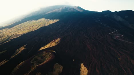 Drone-flying-over-a-volcano-crater-at-Mount-Etna,-Sicily