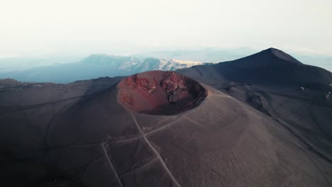 Drone-flying-over-a-volcano-crater-at-Mount-Etna,-Sicily