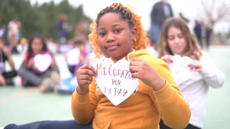 Murcia,-Spain,-January-30,-2024:-Children-of-primary-education-create-hearts-with-the-sentence-"My-hear-for-the-peace