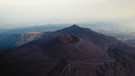 Drone-flying-over-a-volcano-crater-at-Mount-Etna,-Sicily