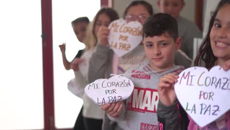 Murcia,-Spain,-January-30,-2024:-Children-of-primary-education-create-hearts-with-the-sentence-"My-hear-for-the-peace