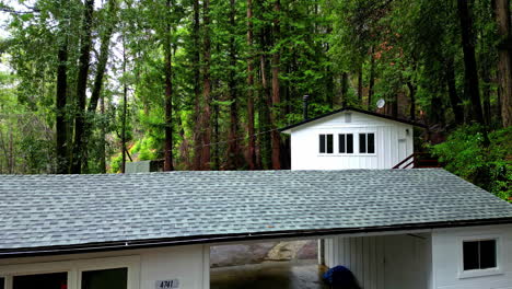 Aerial-Drone-Fly-Above-White-Houses-inside-Muir-Woods-National-Monument-at-Redwoods-park