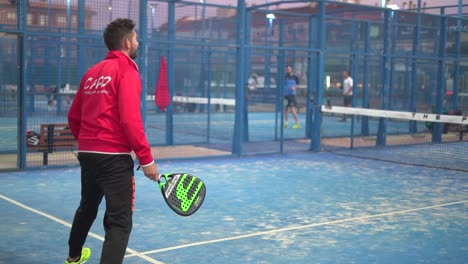 Murcia,-Spain,-February-2,-2024:-Young-sportsmen-playing-padel-tennis-in-slow-motion