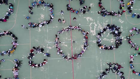 Murcia,-España,-30-De-Enero-De-2024:-Los-Niños-De-Educación-Primaria-Crean-Corazones-Con-La-Frase-&quot;mi-Oído-Por-La-Paz