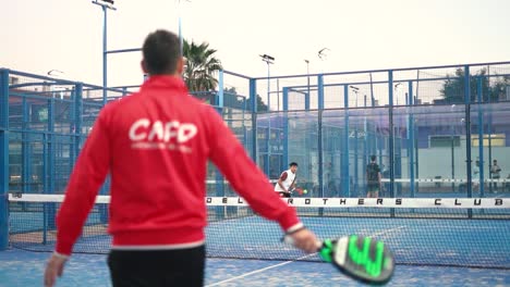 Murcia,-Spain,-February-2,-2024:-Young-sportsmen-playing-padel-tennis-in-slow-motion