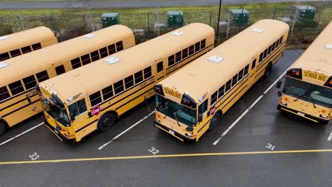 Panning-video-of-school-buses-in-the-Edmonds-School-District-Transportation-Center-in-Lynnwood,-WA