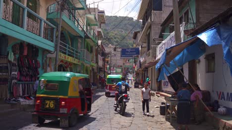 Busy,-colourful,-crowded-street-in-San-Pedro,-Lake-Atitlan,-Guatemala