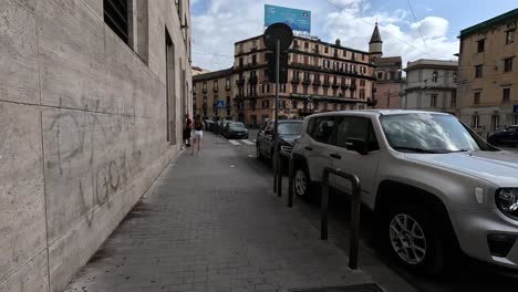 POV-shot-of-walking-street-to-the-city-centre-of-Naples-in-Italy