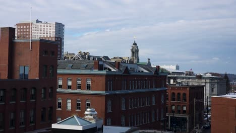 Aerial-view-of-new-office-buildin-and-city-hall-in-background