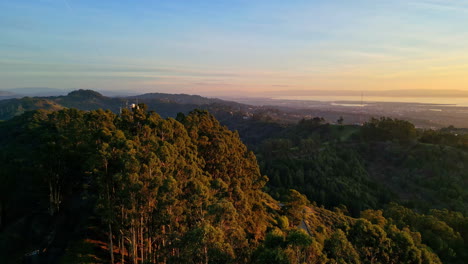 Aerial-Drone-Landscape,-Sunset-at-Grizzly-Peak-Summit-Hills-above-California-Sky