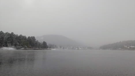 Calm-Foggy-Evergreen-Lake-house-downtown-foggy-Colorado-historic-downtown-aerial-drone-blizzard-fall-autumn-winter-first-snowfall-foggy-Rocky-Mountain-front-range-Denver-forward-motion