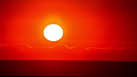 Glowing-sunset-over-the-Pacific-Ocean-as-seen-from-Manhattan-Beach,-California---time-lapse-zoomed-in