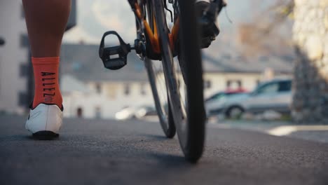 a-road-cyclist-man-starting-his-ride-in-full-bicycle-gear