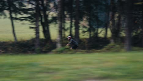 male-bicycle-rider-rolling-fast-in-the-mountains-with-his-road-bike