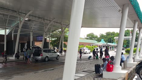 Exterior-view-of-Kupang-El-Tari-International-Airport-arrivals-terminal-in-East-Nusa-Tenggara-with-local-people-and-tourist-arriving-from-flights-for-onward-travel-journey