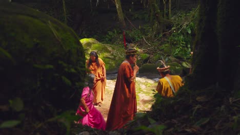 Indigenous-people-in-traditional-attire-in-Pucallpa,-Peru,-engaging-in-a-cultural-ceremony-in-the-forest