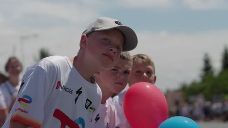 Young-spectators-supporting-at-the-Tour-de-France-during-afternoon-in-France