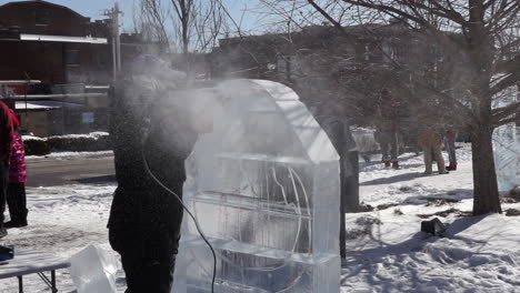 Ice-sculptor-crafting-ice-sculptures-in-slow-motion-detail