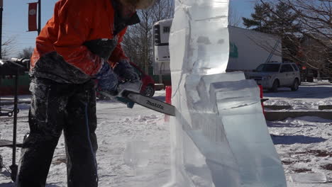 Ice-sculptor-crafting-ice-sculptures-in-slow-motion-detail