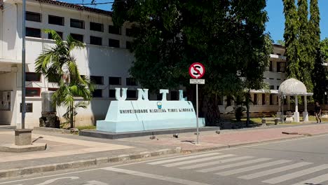 Close-up-view-of-UNTL-sign-outside-the-campus-building-for-National-University-of-Timor-Leste-in-the-capital-city-of-East-Timor,-Southeast-Asia