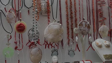 Artificial-jewellery,-fashion-accessories-for-sale-displayed-in-shop-window