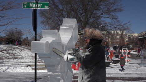 Ice-sculptor-crafting-ice-sculptures-in-slow-motion-detail