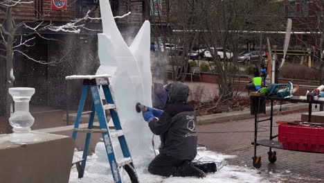 Ice-sculptor-crafting-ice-sculptures-in-slow-motion-detail