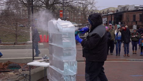 Ice-sculptor-crafting-ice-sculptures-in-slow-motion-detail